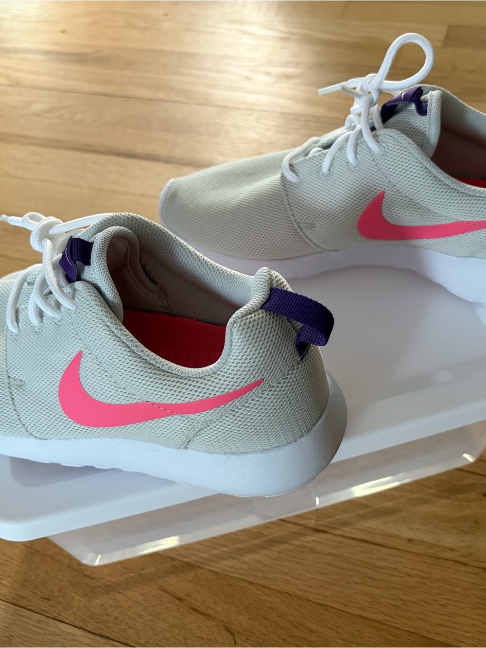 Nike Sneakers in Light Gray with Pink Swoosh and Purple Heel Tab